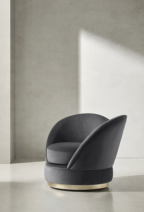 The curved shapes of the Blooms armchair, designed by Soraya Pla, are the hallmark of the Evolution line of contemporary luxury furniture from the Spanish manufacturer Coleccion Alexandra.