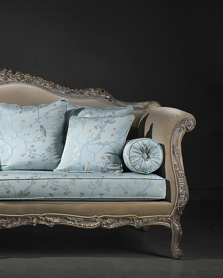 Lucia classic sofa in carved wood, upholstered with velvet and embroidered fabric.