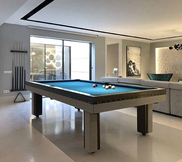 Modern luxury pool table for leisure spaces at home, manufactured with high quality materials and customised finishes.