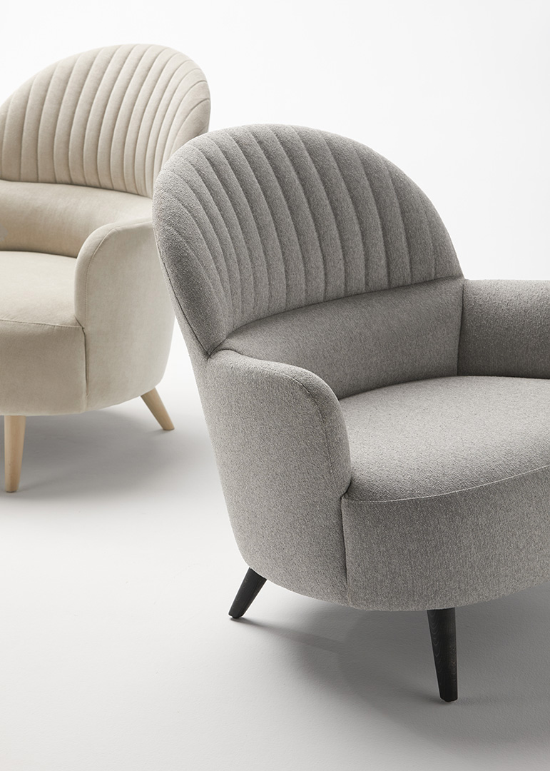 Partial view of the modern Cricket armchairs designed by José Manuel Ferrero de estudihac exclusively for the Alexandra Forwards collection.