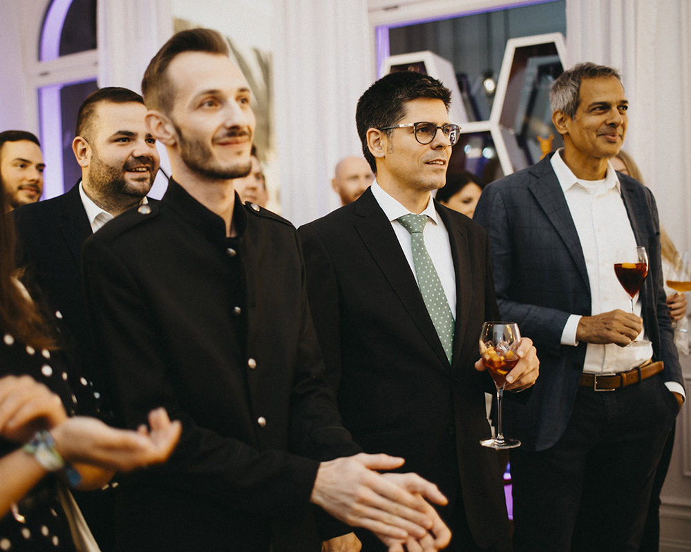 Guests enjoying the grand opening event of Colección Alexandra's first flagship store in Prague
