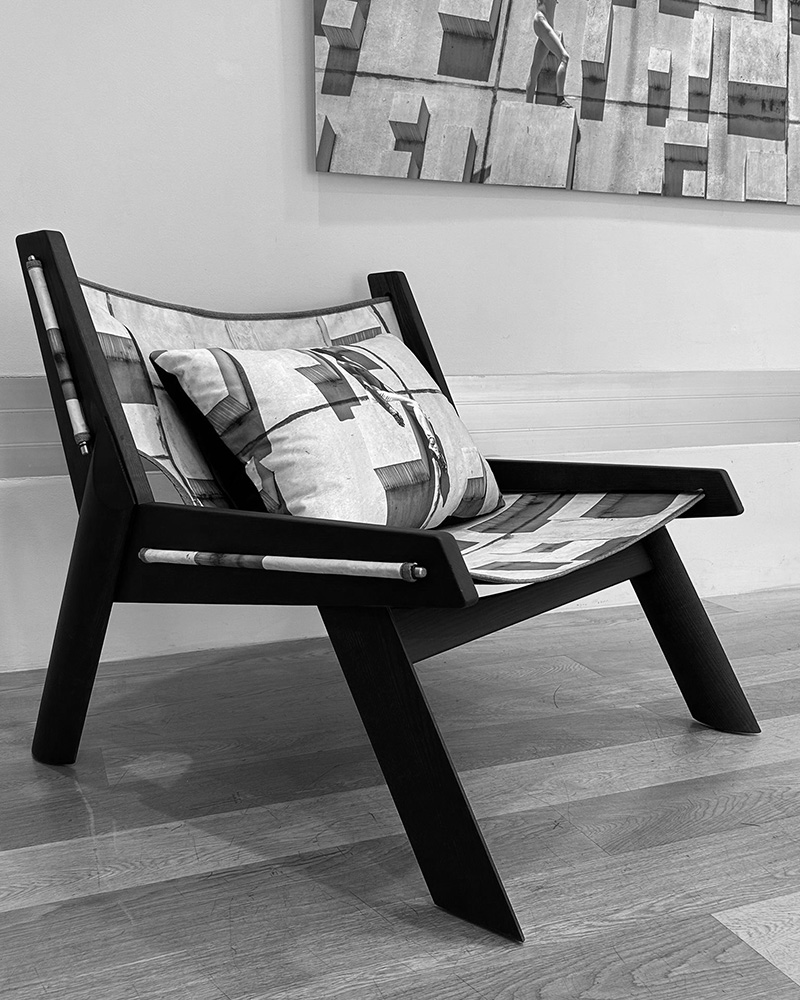 The Ibiza armchair by Alexandra has been customised with an exclusive fabric that reproduces a photograph by Juan Carlos Vega.